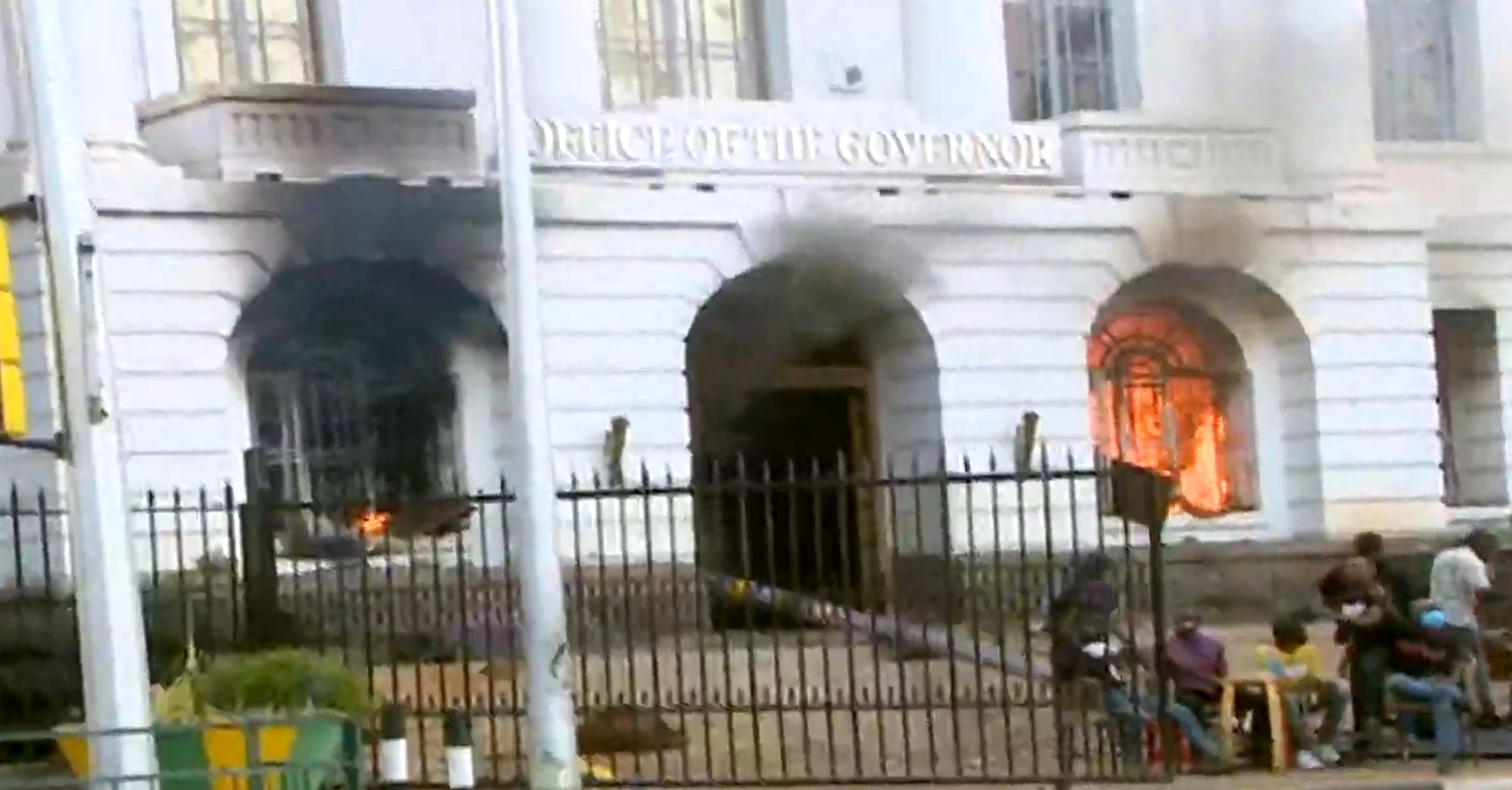 A screengrab image of City Hall on fire.